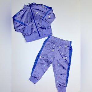 Baby girl Nike warm up set. Pink/purple pebble pattern. Size 12m